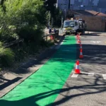 Car park line marking Sydney with green cycle lane markings and traffic cones