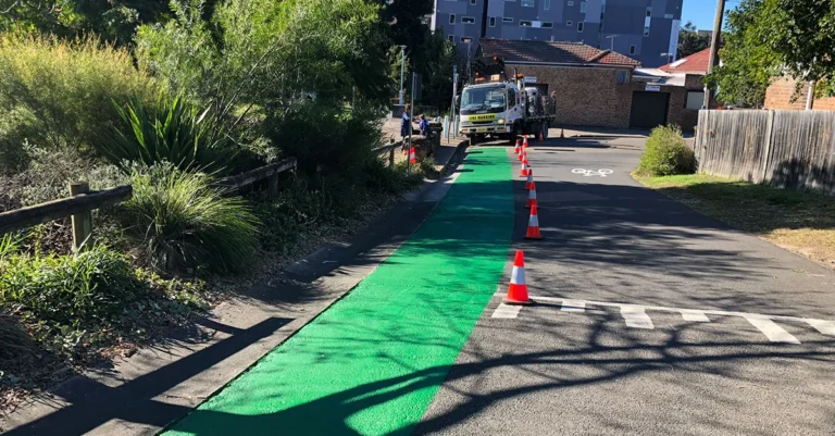 Car park line marking Sydney with green cycle lane markings and traffic cones